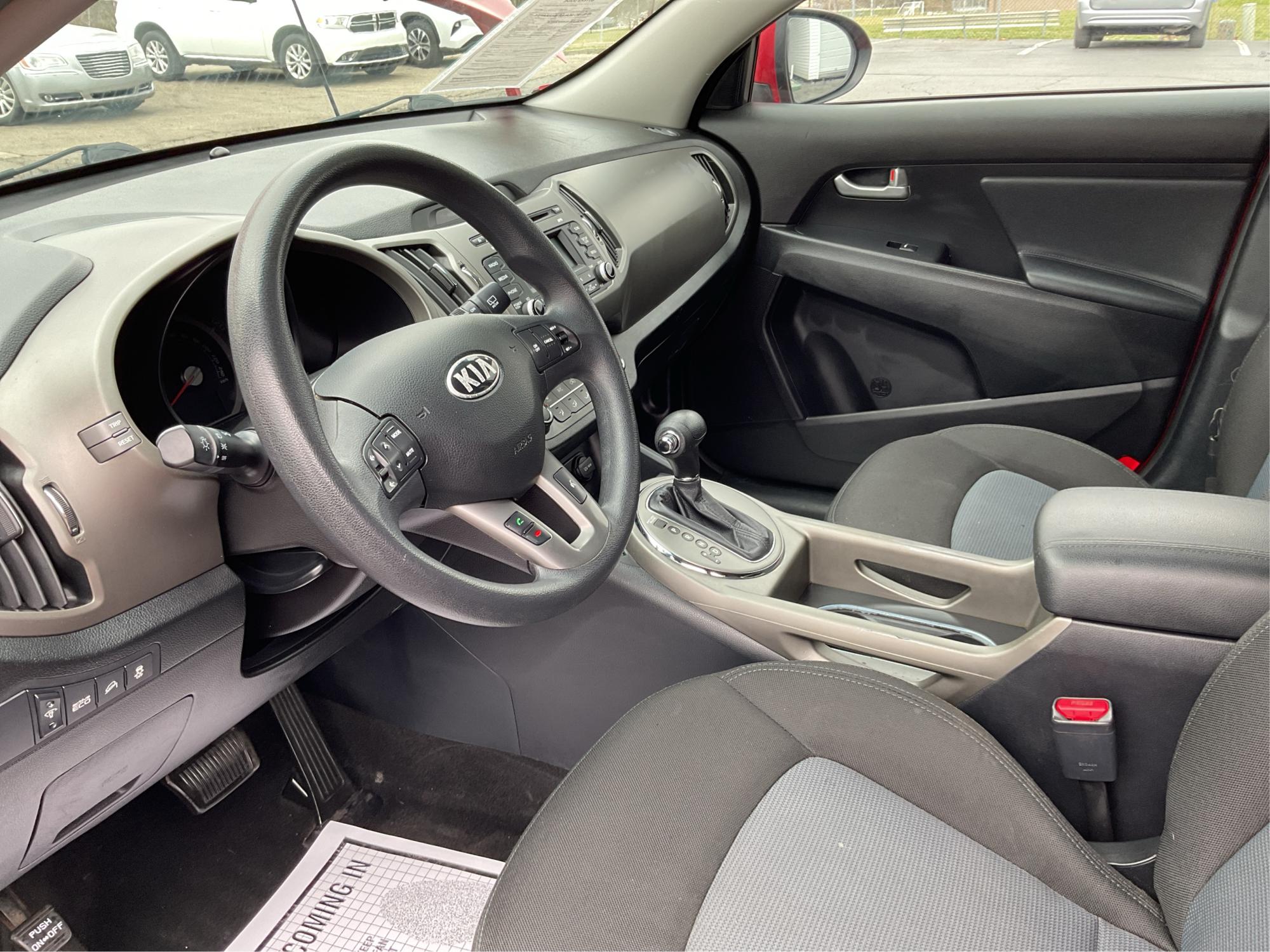 2014 Kia Sportage LX (KNDPB3AC1E7) with an 2.4L I-4 gasoline direct injection engine, located at 8750 N County Rd 25A, Piqua, OH, 45356, (937) 908-9800, 40.164391, -84.232513 - Photo#8