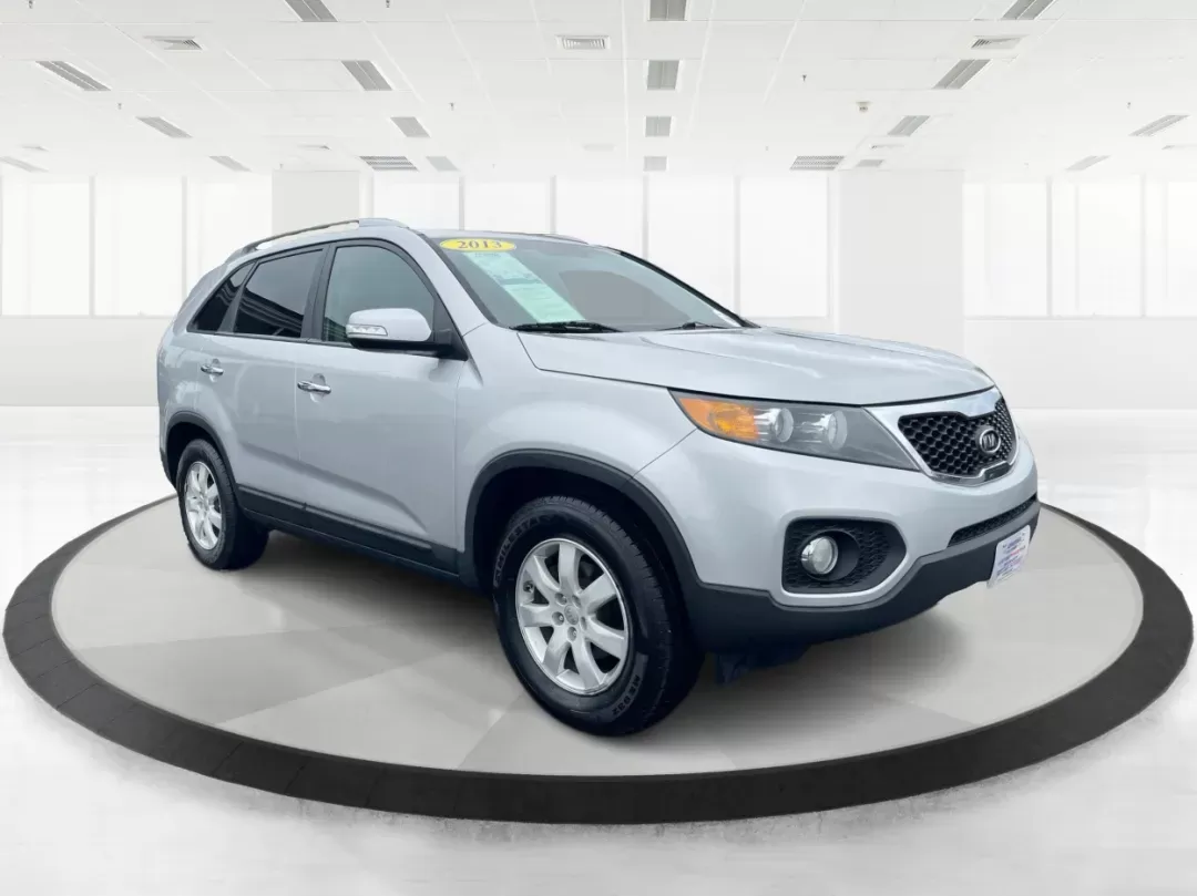 2013 Kia Sorento LX (5XYKT3A61DG) with an 2.4L I-4 gasoline direct injection engine, located at 401 Woodman Dr, Riverside, OH, 45431, (937) 908-9800, 39.760899, -84.123421 - 2013 Kia Sorento LX - Photo#0