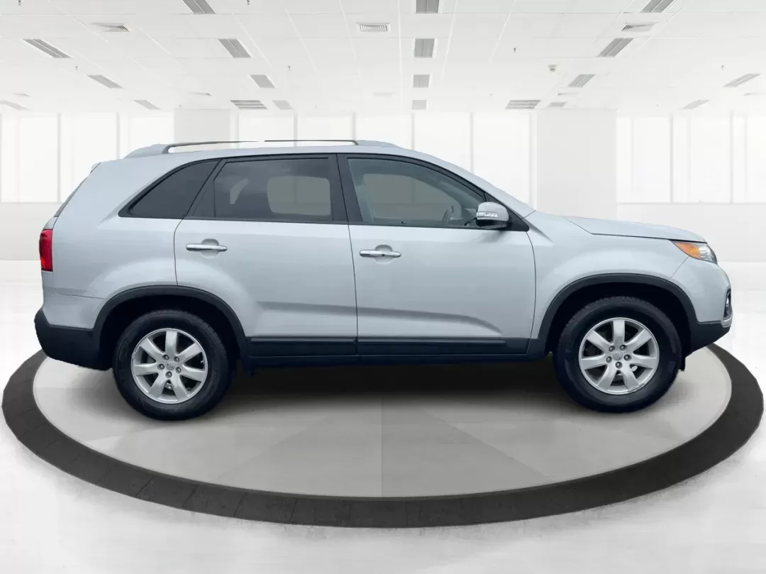 2013 Kia Sorento LX (5XYKT3A61DG) with an 2.4L I-4 gasoline direct injection engine, located at 401 Woodman Dr, Riverside, OH, 45431, (937) 908-9800, 39.760899, -84.123421 - 2013 Kia Sorento LX - Photo#1