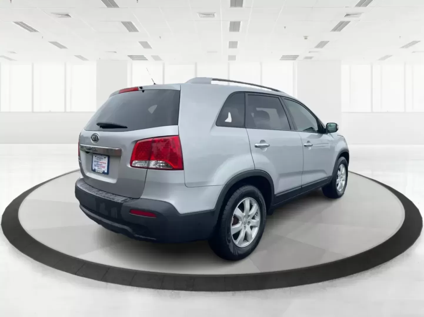 2013 Kia Sorento LX (5XYKT3A61DG) with an 2.4L I-4 gasoline direct injection engine, located at 401 Woodman Dr, Riverside, OH, 45431, (937) 908-9800, 39.760899, -84.123421 - 2013 Kia Sorento LX - Photo#2