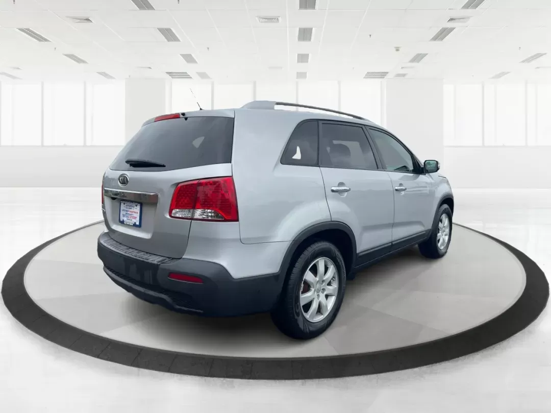2013 Kia Sorento LX (5XYKT3A61DG) with an 2.4L I-4 gasoline direct injection engine, located at 401 Woodman Dr, Riverside, OH, 45431, (937) 908-9800, 39.760899, -84.123421 - 2013 Kia Sorento LX - Photo#2