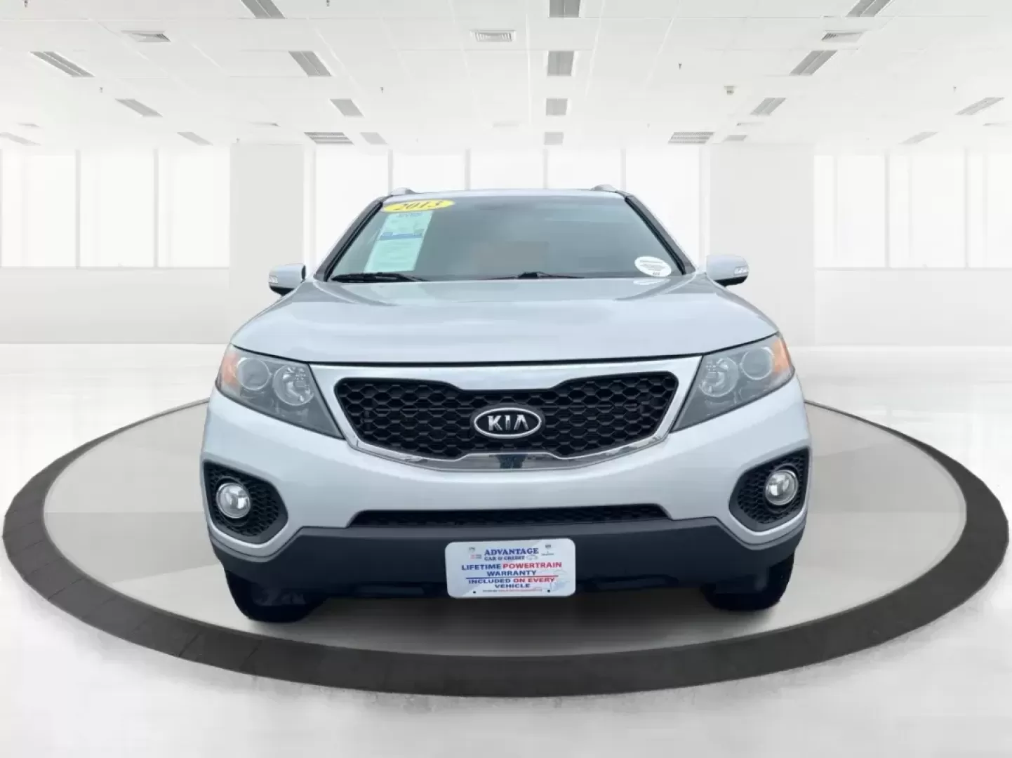 2013 Kia Sorento LX (5XYKT3A61DG) with an 2.4L I-4 gasoline direct injection engine, located at 401 Woodman Dr, Riverside, OH, 45431, (937) 908-9800, 39.760899, -84.123421 - 2013 Kia Sorento LX - Photo#6