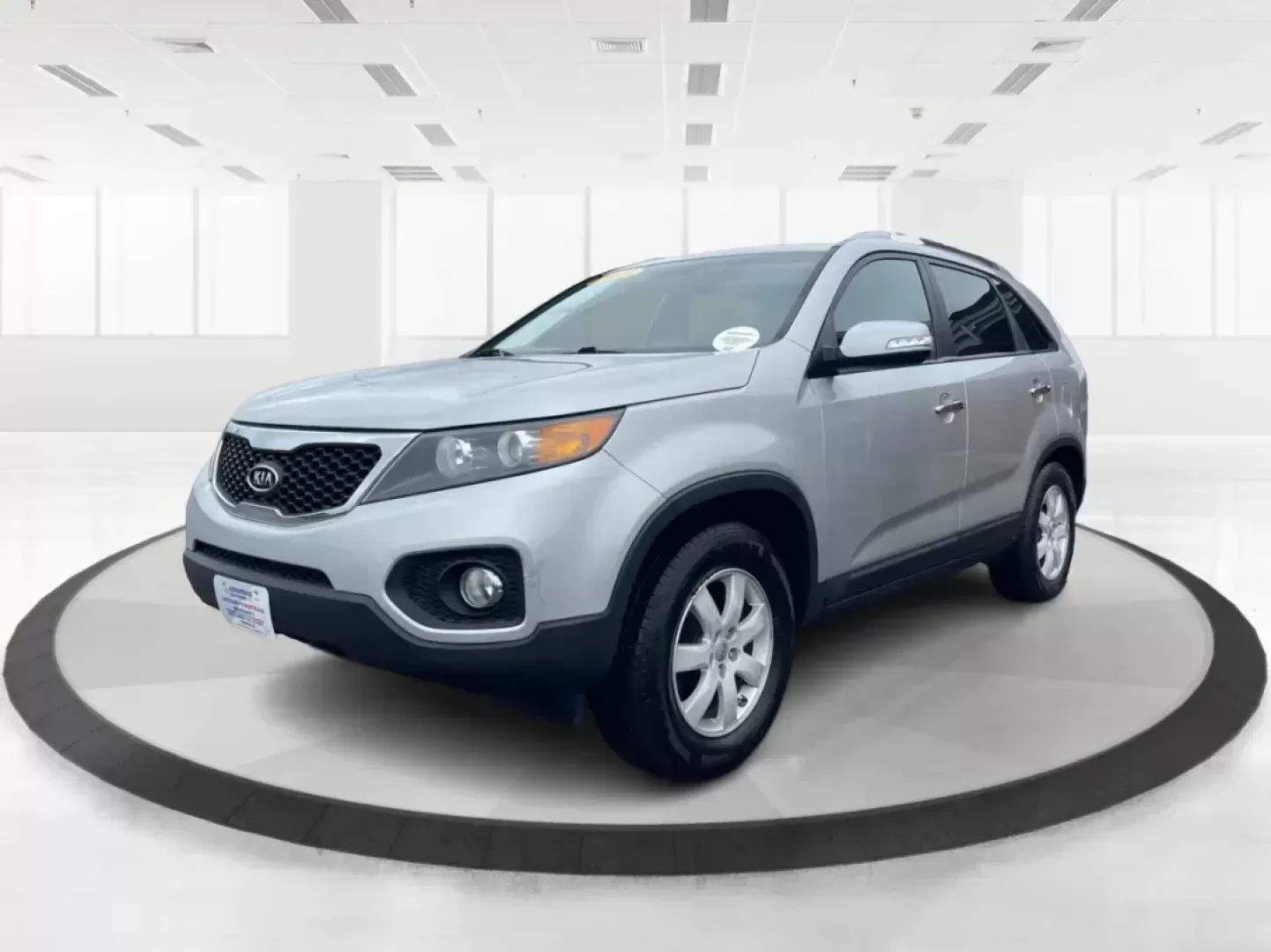 2013 Kia Sorento LX (5XYKT3A61DG) with an 2.4L I-4 gasoline direct injection engine, located at 401 Woodman Dr, Riverside, OH, 45431, (937) 908-9800, 39.760899, -84.123421 - 2013 Kia Sorento LX - Photo#7