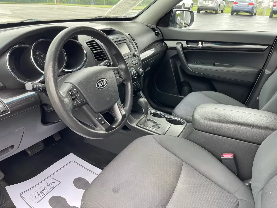 2013 Kia Sorento LX (5XYKT3A61DG) with an 2.4L I-4 gasoline direct injection engine, located at 401 Woodman Dr, Riverside, OH, 45431, (937) 908-9800, 39.760899, -84.123421 - 2013 Kia Sorento LX - Photo#8