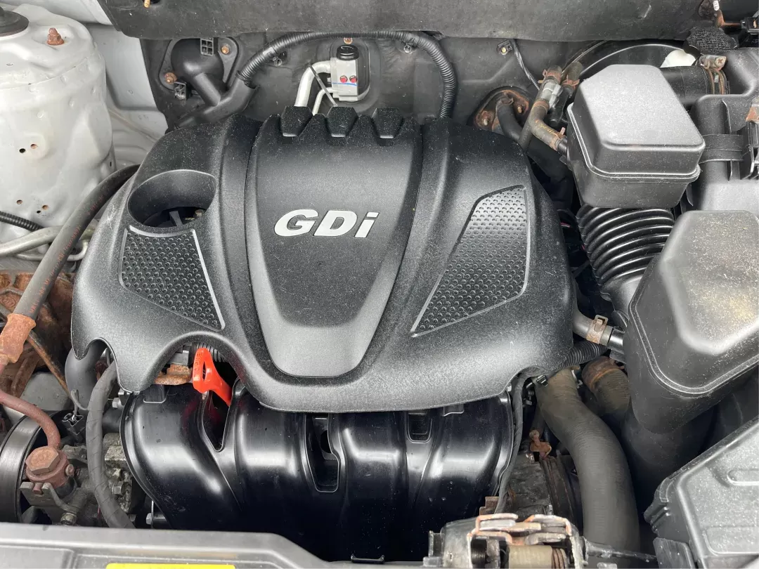 2013 Kia Sorento LX (5XYKT3A61DG) with an 2.4L I-4 gasoline direct injection engine, located at 401 Woodman Dr, Riverside, OH, 45431, (937) 908-9800, 39.760899, -84.123421 - 2013 Kia Sorento LX - Photo#10