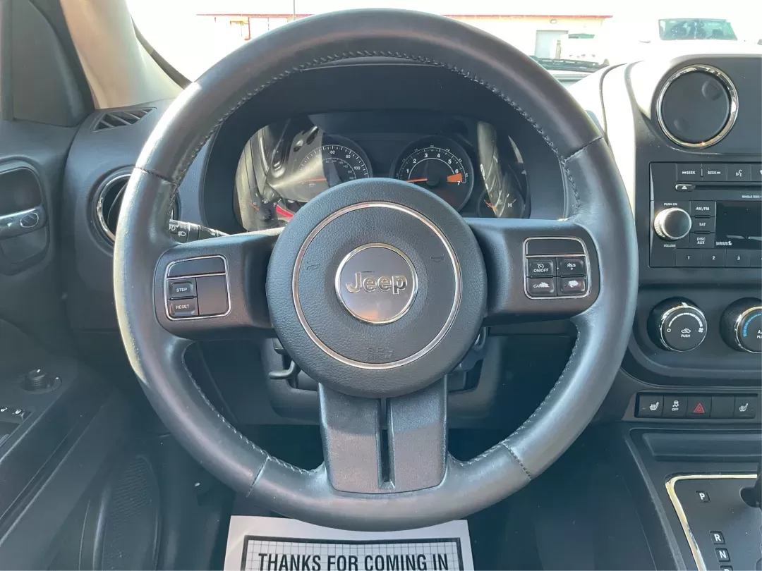 2015 Jeep Patriot Latitude (1C4NJRFB2FD) with an 2.4L I-4 DOHC engine, located at 1099 N County Rd 25A , Troy, OH, 45373, (937) 908-9800, 40.057079, -84.212883 - 2015 Jeep Patriot Latitude - Photo#14