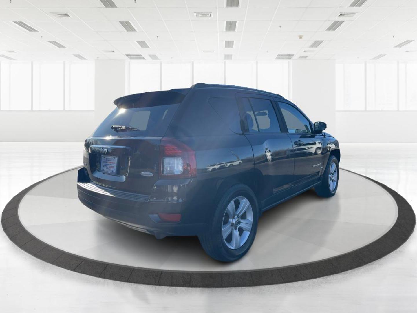 2014 Jeep Compass Latitude (1C4NJDEB7ED) with an Other engine, located at 8750 N County Rd 25A, Piqua, OH, 45356, (937) 908-9800, 40.164391, -84.232513 - Photo#2