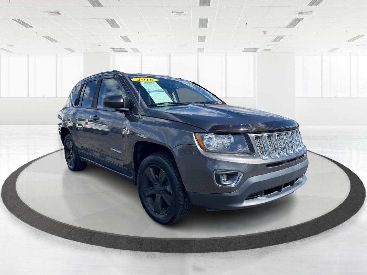 2016 Jeep Compass High Altitude Edition (1C4NJCEA4GD) with an 2L I-4 DOHC engine, located at 401 Woodman Dr, Riverside, OH, 45431, (937) 908-9800, 39.760899, -84.123421 - Photo#0