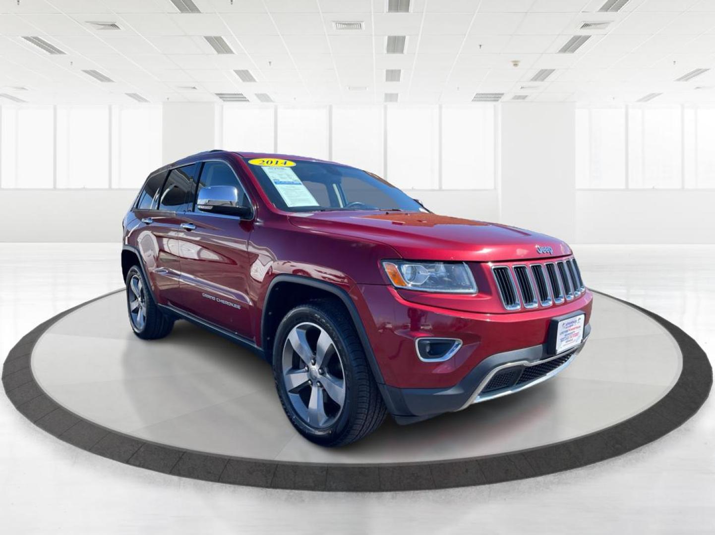 2014 Jeep Grand Cherokee Limited (1C4RJFBG5EC) with an 3.6L V-6 DOHC engine, located at 880 E. National Road, Vandalia, OH, 45377, (937) 908-9800, 39.891918, -84.183594 - Photo#0