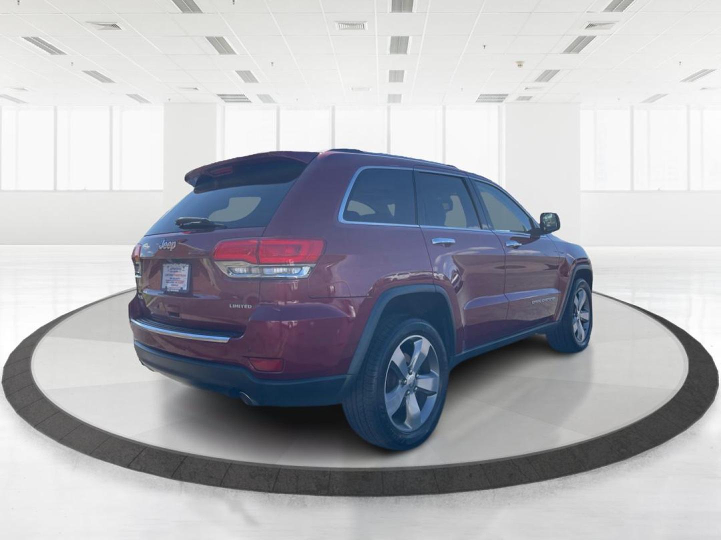 2014 Jeep Grand Cherokee Limited (1C4RJFBG5EC) with an 3.6L V-6 DOHC engine, located at 880 E. National Road, Vandalia, OH, 45377, (937) 908-9800, 39.891918, -84.183594 - Photo#2