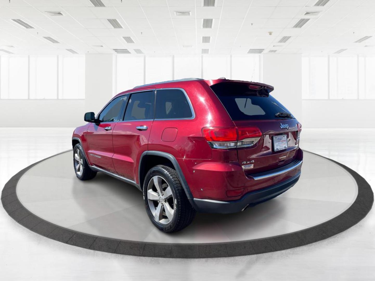 2014 Jeep Grand Cherokee Limited (1C4RJFBG5EC) with an 3.6L V-6 DOHC engine, located at 880 E. National Road, Vandalia, OH, 45377, (937) 908-9800, 39.891918, -84.183594 - Photo#4