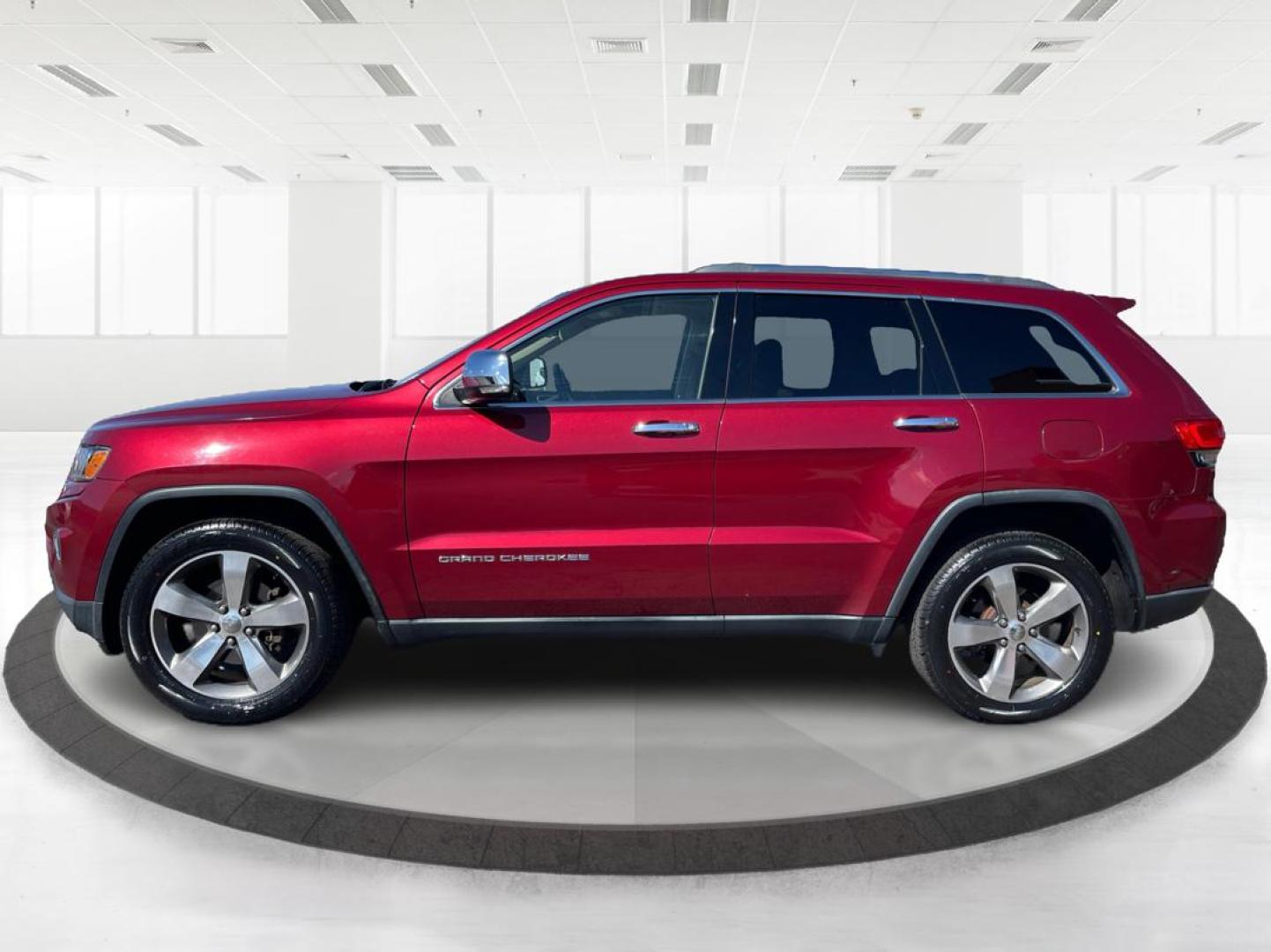 2014 Jeep Grand Cherokee Limited (1C4RJFBG5EC) with an 3.6L V-6 DOHC engine, located at 880 E. National Road, Vandalia, OH, 45377, (937) 908-9800, 39.891918, -84.183594 - Photo#5