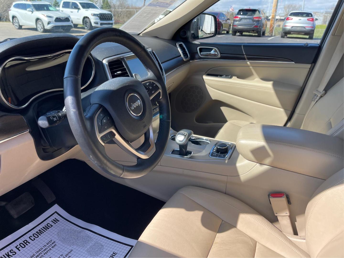2014 Jeep Grand Cherokee Limited (1C4RJFBG5EC) with an 3.6L V-6 DOHC engine, located at 880 E. National Road, Vandalia, OH, 45377, (937) 908-9800, 39.891918, -84.183594 - Photo#8