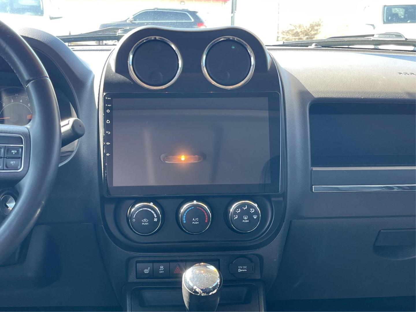 2016 Jeep Patriot High Altitude Edition (1C4NJPFAXGD) with an 2L I-4 DOHC engine, located at 8750 N County Rd 25A, Piqua, OH, 45356, (937) 908-9800, 40.164391, -84.232513 - Photo#12