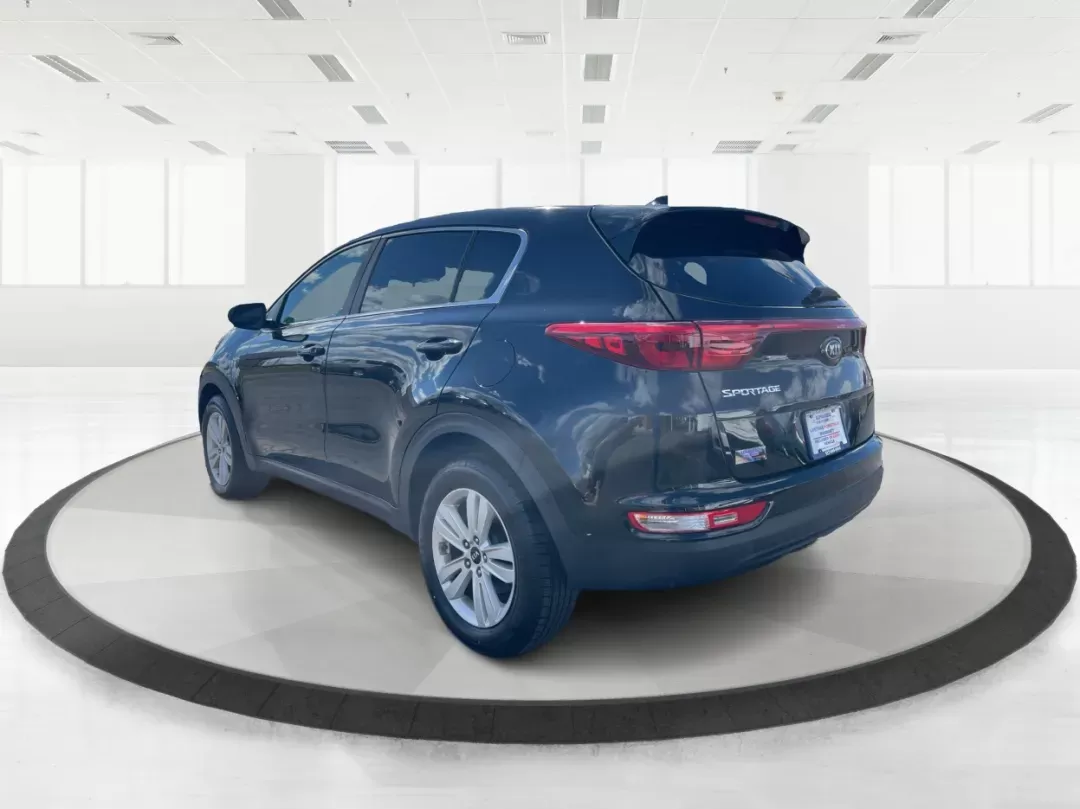 2019 Kia Sportage LX (KNDPMCACXK7) with an Theta II 2.4L I-4 gasoline direct injection engine, located at 8750 N County Rd 25A, Piqua, OH, 45356, (937) 908-9800, 40.164391, -84.232513 - Photo#4