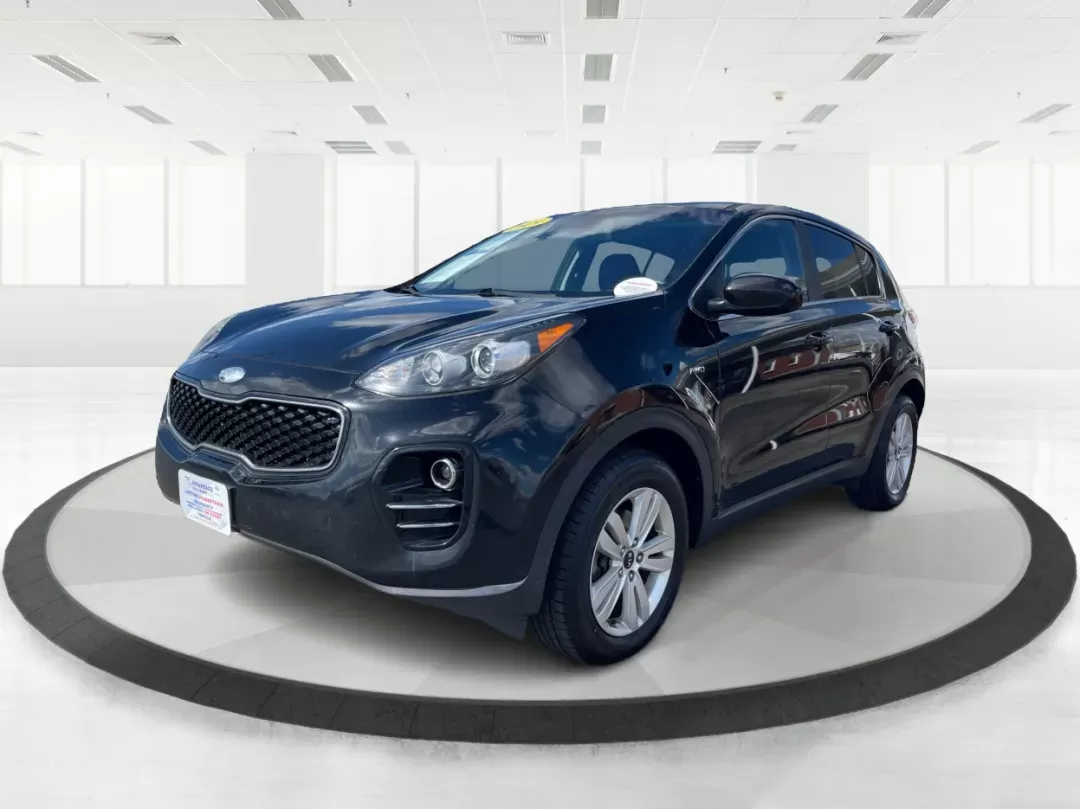 2019 Kia Sportage LX (KNDPMCACXK7) with an Theta II 2.4L I-4 gasoline direct injection engine, located at 8750 N County Rd 25A, Piqua, OH, 45356, (937) 908-9800, 40.164391, -84.232513 - Photo#7
