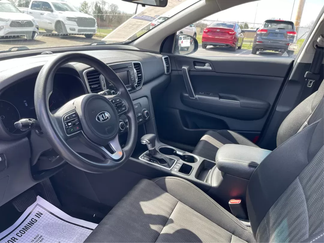 2019 Kia Sportage LX (KNDPMCACXK7) with an Theta II 2.4L I-4 gasoline direct injection engine, located at 8750 N County Rd 25A, Piqua, OH, 45356, (937) 908-9800, 40.164391, -84.232513 - Photo#8