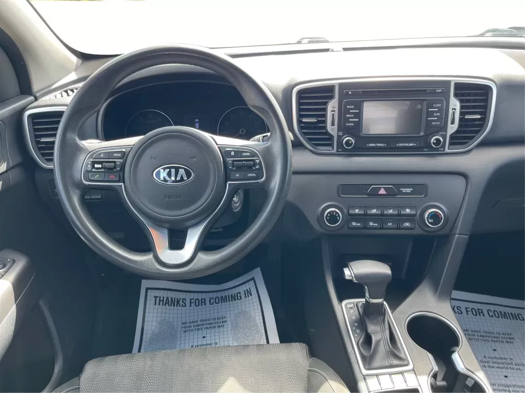 2019 Kia Sportage LX (KNDPMCACXK7) with an Theta II 2.4L I-4 gasoline direct injection engine, located at 8750 N County Rd 25A, Piqua, OH, 45356, (937) 908-9800, 40.164391, -84.232513 - Photo#19