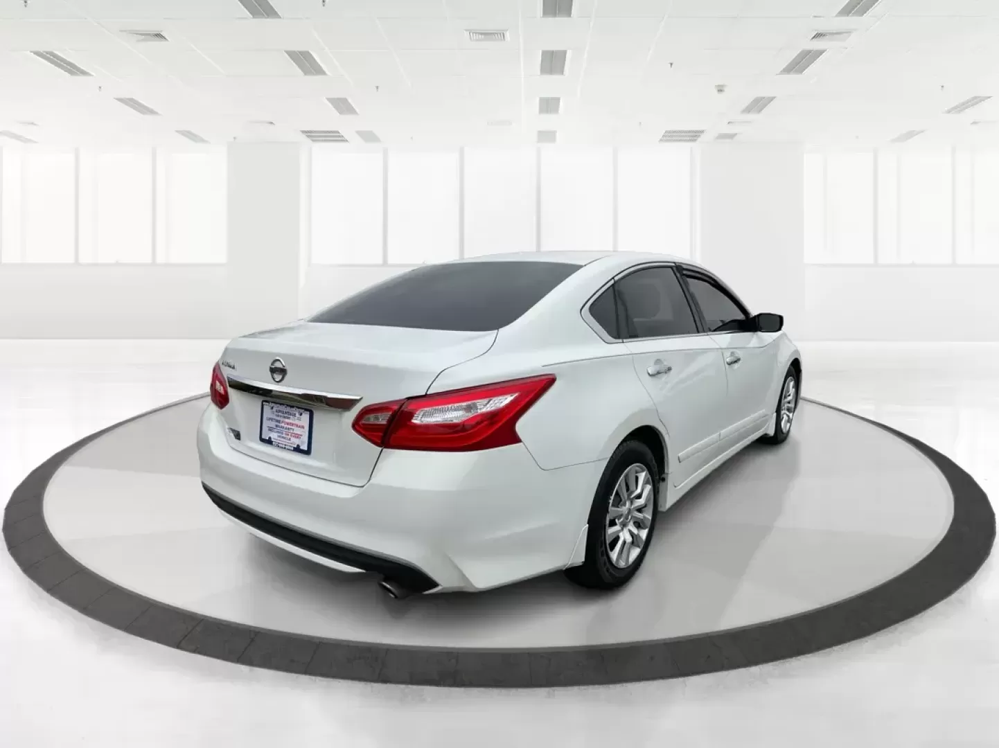 2016 Nissan Altima 2.5 S (1N4AL3AP7GN) with an 2.5L I-4 DOHC engine, located at 1951 S Dayton Lakeview Rd., New Carlisle, OH, 45344, (937) 908-9800, 39.890999, -84.050255 - Photo#2