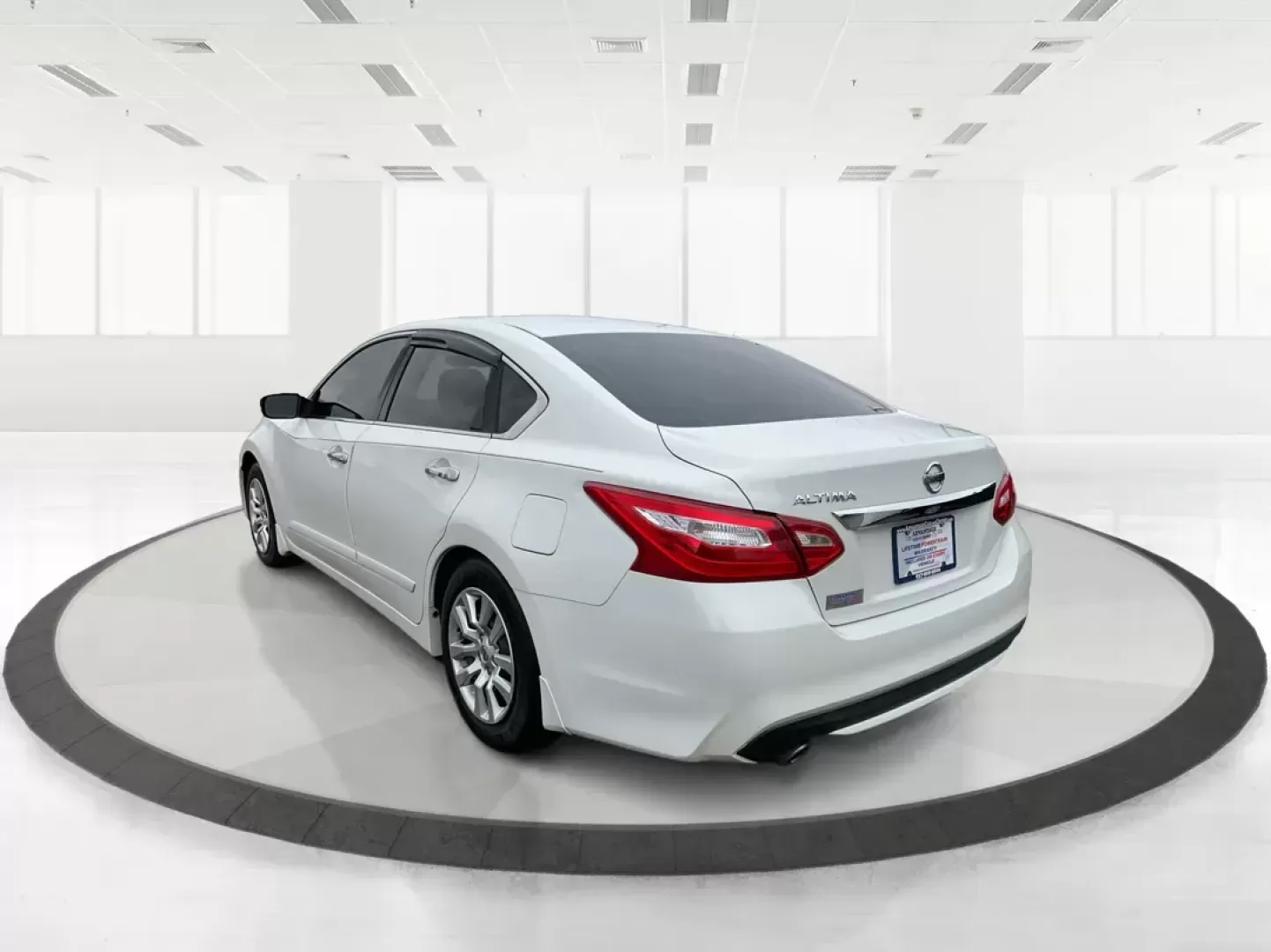 2016 Nissan Altima 2.5 S (1N4AL3AP7GN) with an 2.5L I-4 DOHC engine, located at 1951 S Dayton Lakeview Rd., New Carlisle, OH, 45344, (937) 908-9800, 39.890999, -84.050255 - Photo#4