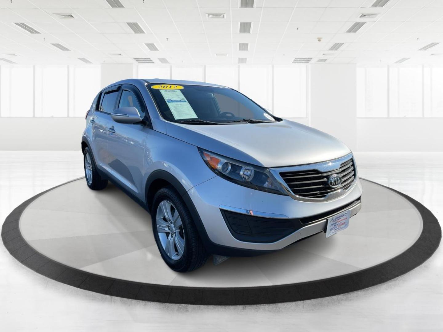 2012 Kia Sportage LX (KNDPB3A21C7) with an 2.4L I-4 DOHC engine, located at 401 Woodman Dr, Riverside, OH, 45431, (937) 908-9800, 39.760899, -84.123421 - Photo#0