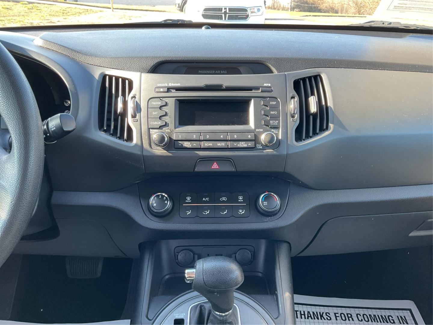 2012 Kia Sportage LX (KNDPB3A21C7) with an 2.4L I-4 DOHC engine, located at 401 Woodman Dr, Riverside, OH, 45431, (937) 908-9800, 39.760899, -84.123421 - Photo#12
