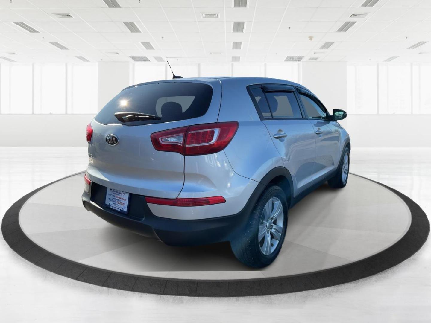 2012 Kia Sportage LX (KNDPB3A21C7) with an 2.4L I-4 DOHC engine, located at 401 Woodman Dr, Riverside, OH, 45431, (937) 908-9800, 39.760899, -84.123421 - Photo#2