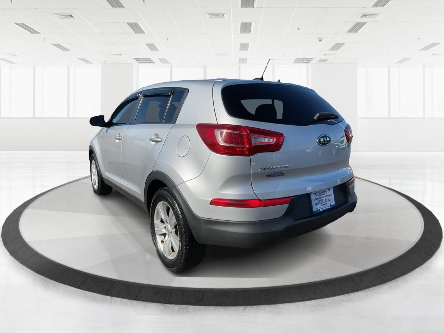 2012 Kia Sportage LX (KNDPB3A21C7) with an 2.4L I-4 DOHC engine, located at 401 Woodman Dr, Riverside, OH, 45431, (937) 908-9800, 39.760899, -84.123421 - Photo#4