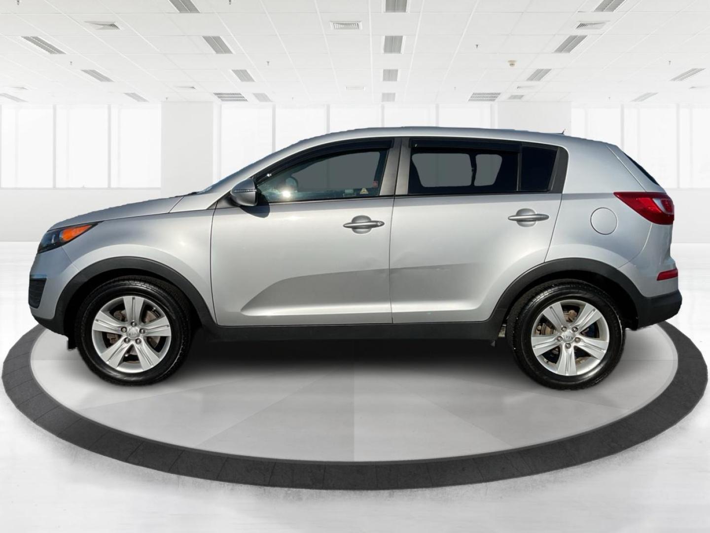 2012 Kia Sportage LX (KNDPB3A21C7) with an 2.4L I-4 DOHC engine, located at 401 Woodman Dr, Riverside, OH, 45431, (937) 908-9800, 39.760899, -84.123421 - Photo#5