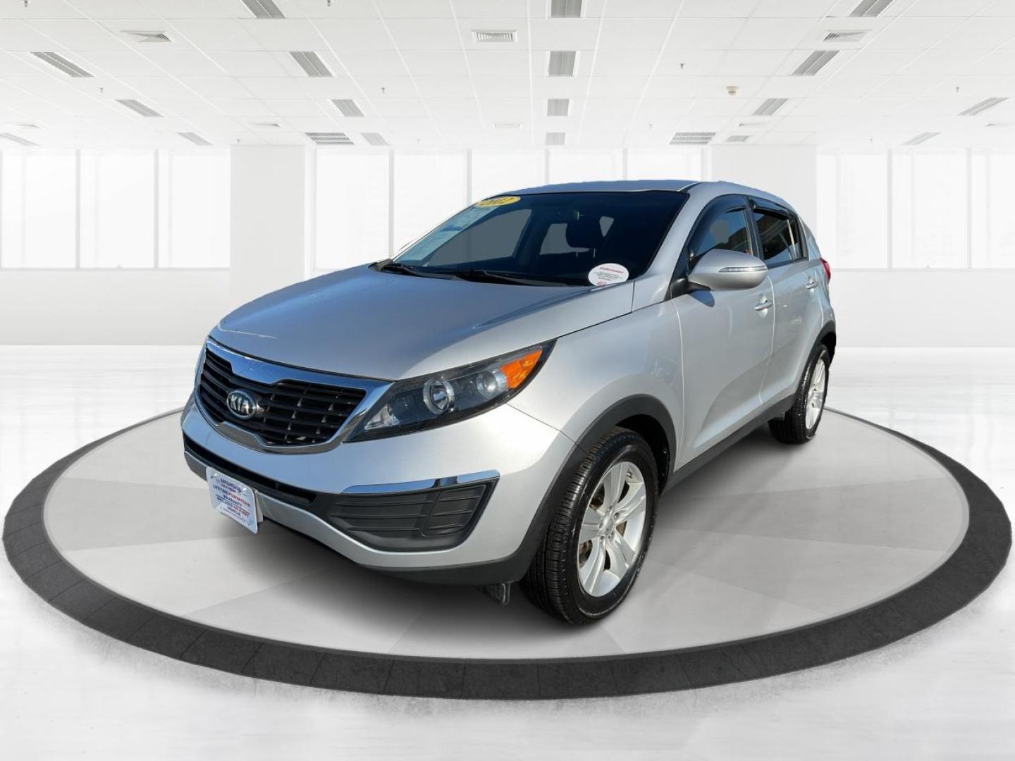 2012 Kia Sportage LX (KNDPB3A21C7) with an 2.4L I-4 DOHC engine, located at 401 Woodman Dr, Riverside, OH, 45431, (937) 908-9800, 39.760899, -84.123421 - Photo#7