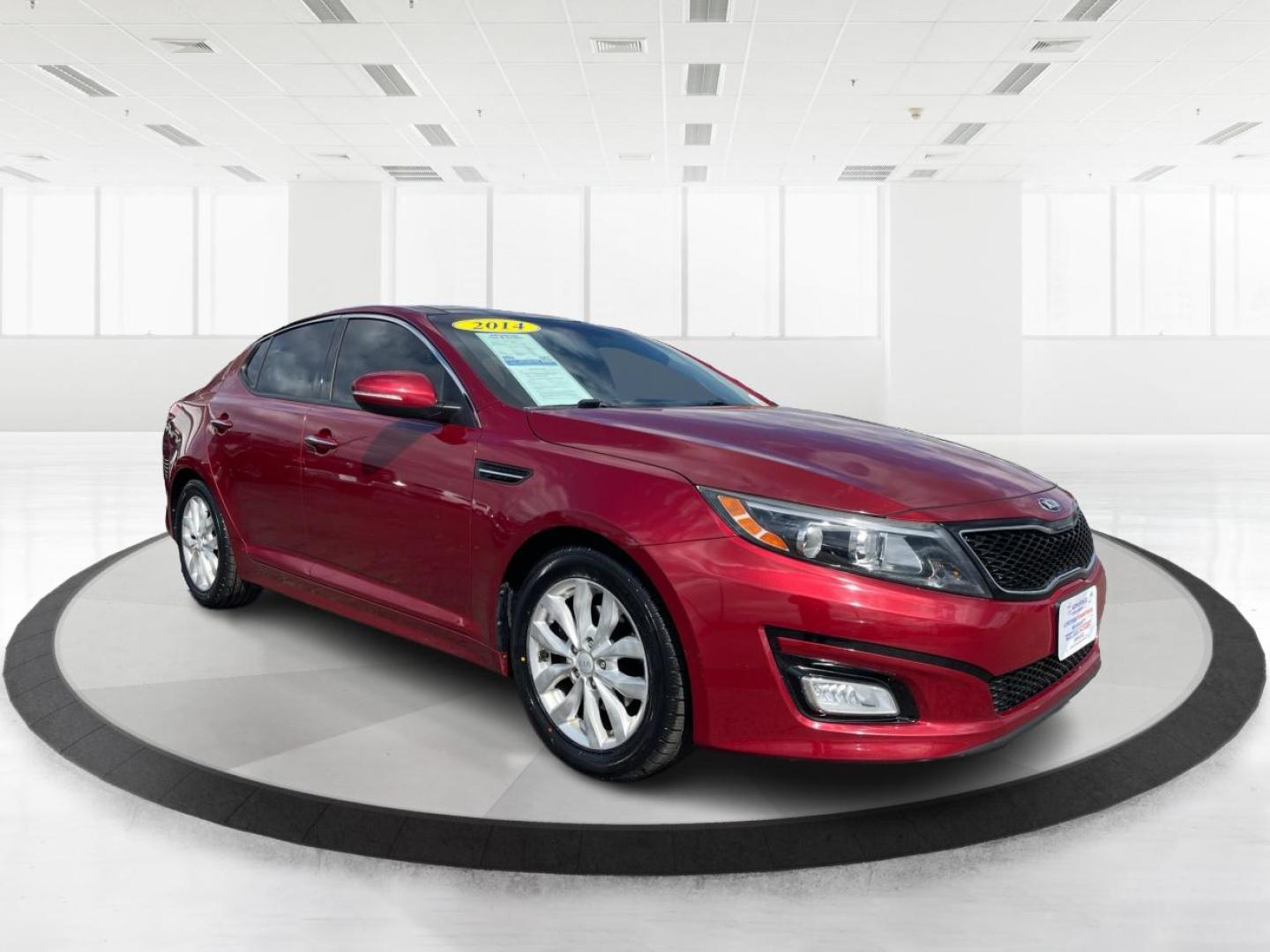 2014 Kia Optima EX (5XXGN4A70EG) with an Theta II 2.4L I-4 gasoline direct injection engine, located at 1184 Kauffman Ave, Fairborn, OH, 45324, (937) 908-9800, 39.807072, -84.030914 - Photo#0