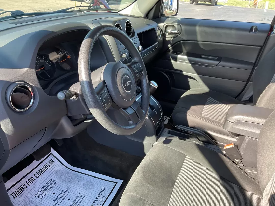 2016 Jeep Patriot Sport (1C4NJRBB0GD) with an 2.4L I-4 DOHC engine, located at 8750 N County Rd 25A, Piqua, OH, 45356, (937) 908-9800, 40.164391, -84.232513 - Photo#6