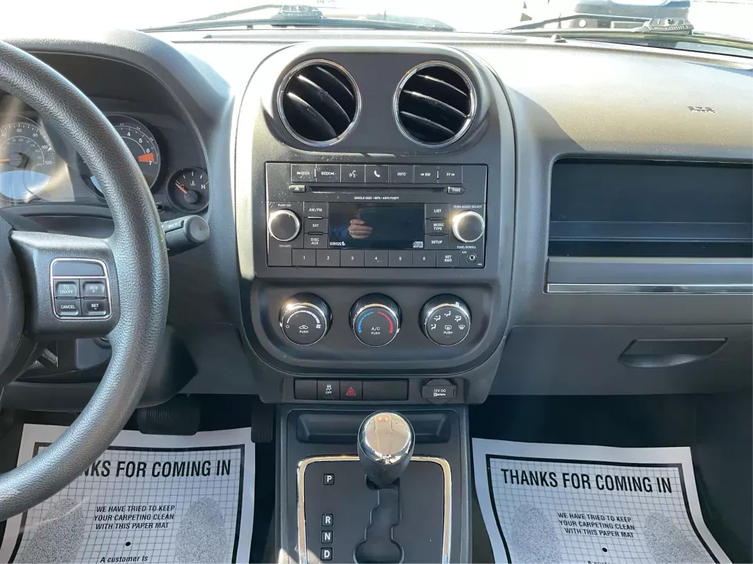 2016 Jeep Patriot Sport (1C4NJRBB0GD) with an 2.4L I-4 DOHC engine, located at 8750 N County Rd 25A, Piqua, OH, 45356, (937) 908-9800, 40.164391, -84.232513 - Photo#10