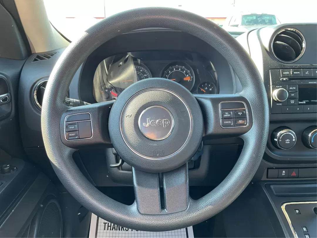 2016 Jeep Patriot Sport (1C4NJRBB0GD) with an 2.4L I-4 DOHC engine, located at 8750 N County Rd 25A, Piqua, OH, 45356, (937) 908-9800, 40.164391, -84.232513 - Photo#13