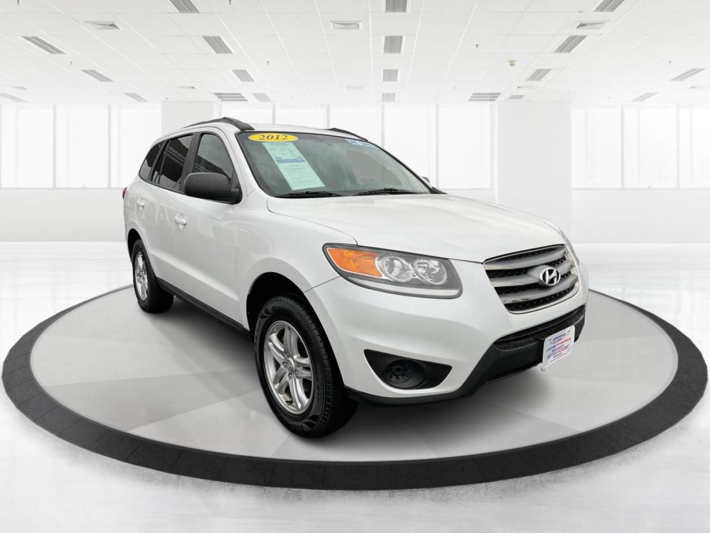 2012 Hyundai Santa Fe GLS (5XYZGDAB5CG) with an 2.4L I-4 DOHC engine, located at 1099 N County Rd 25A, Troy, OH, 45373, (937) 908-9800, 40.057079, -84.212883 - Photo#0