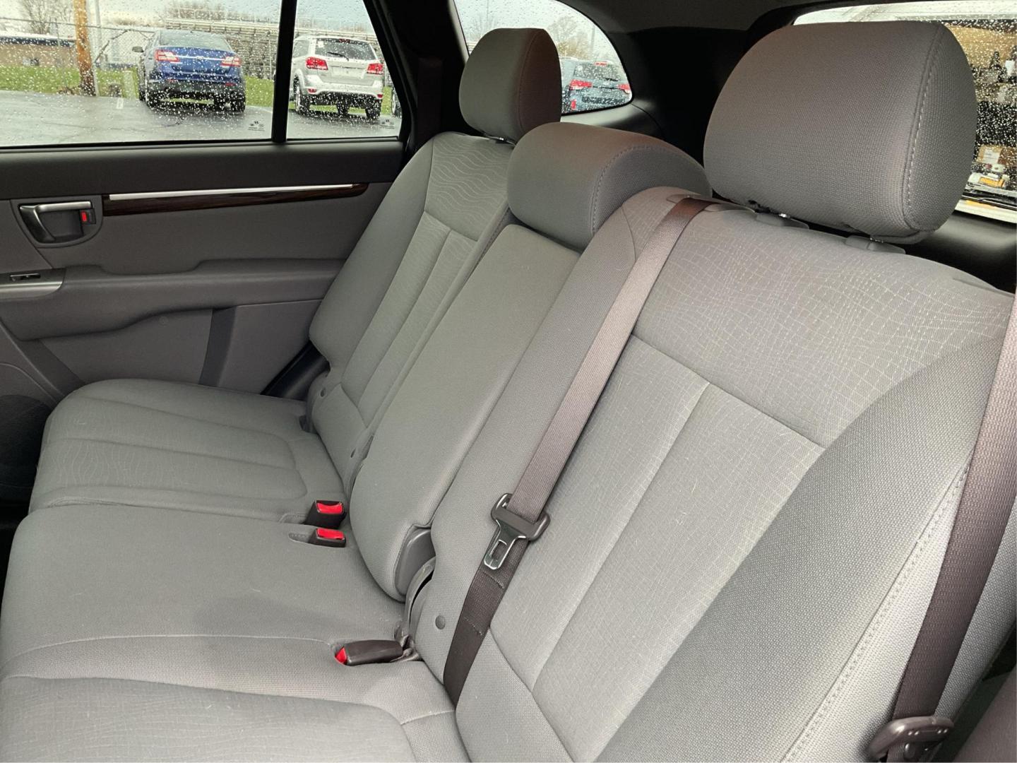 2012 Hyundai Santa Fe GLS (5XYZGDAB5CG) with an 2.4L I-4 DOHC engine, located at 1099 N County Rd 25A, Troy, OH, 45373, (937) 908-9800, 40.057079, -84.212883 - Photo#9