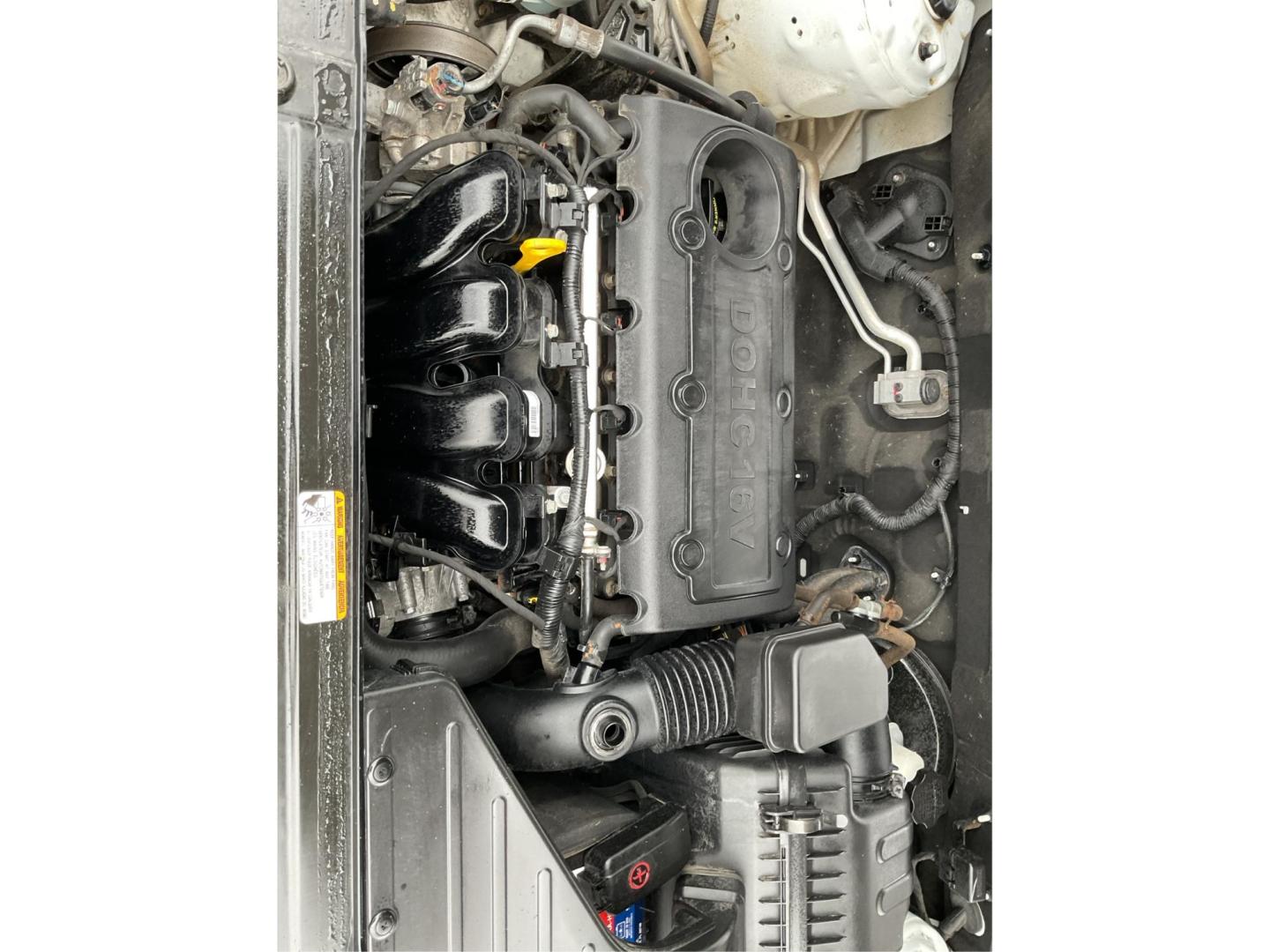2012 Hyundai Santa Fe GLS (5XYZGDAB5CG) with an 2.4L I-4 DOHC engine, located at 1099 N County Rd 25A, Troy, OH, 45373, (937) 908-9800, 40.057079, -84.212883 - Photo#10