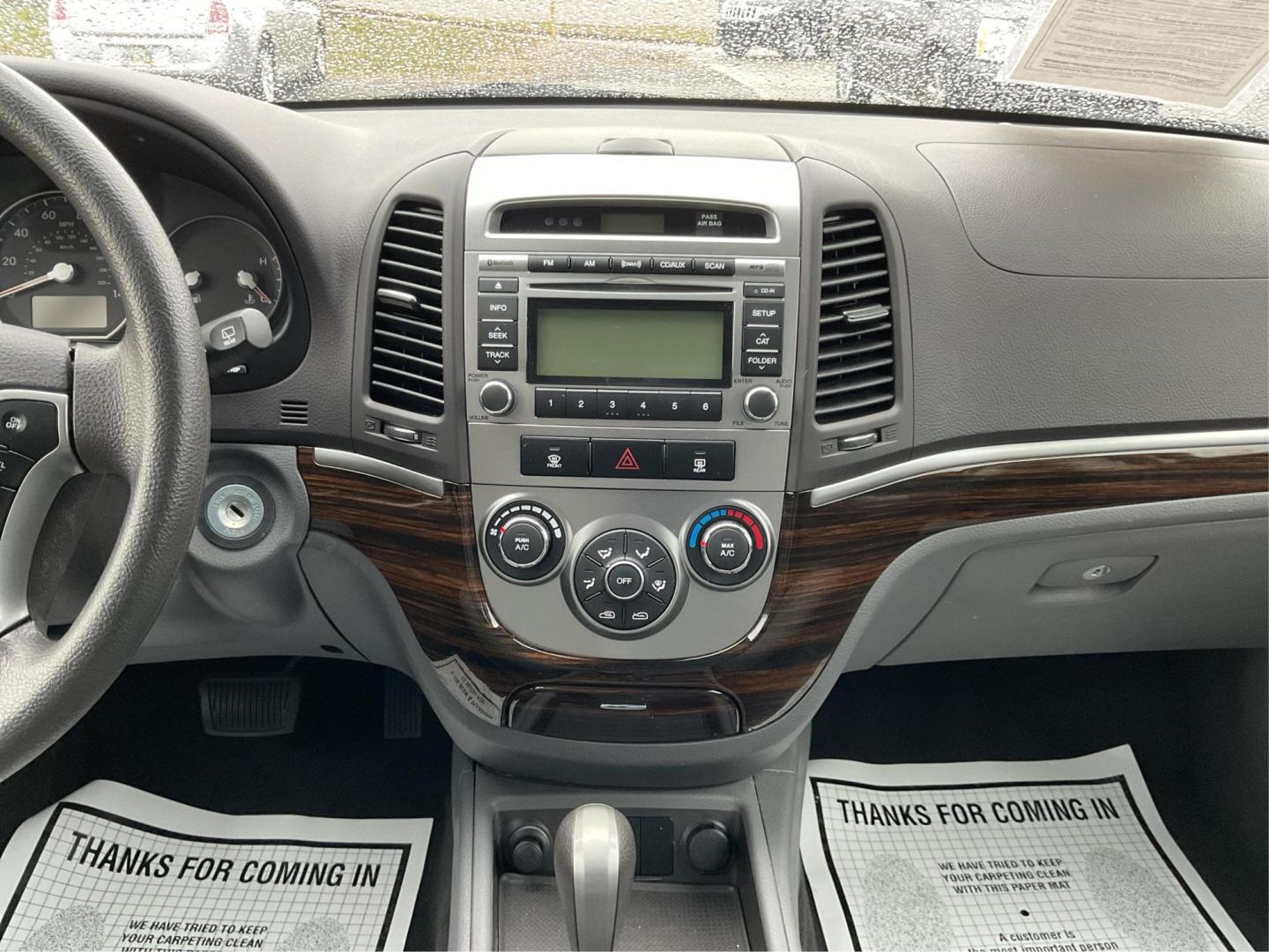 2012 Hyundai Santa Fe GLS (5XYZGDAB5CG) with an 2.4L I-4 DOHC engine, located at 1099 N County Rd 25A, Troy, OH, 45373, (937) 908-9800, 40.057079, -84.212883 - Photo#12
