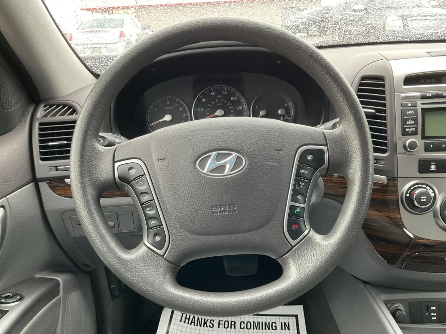 2012 Hyundai Santa Fe GLS (5XYZGDAB5CG) with an 2.4L I-4 DOHC engine, located at 1099 N County Rd 25A, Troy, OH, 45373, (937) 908-9800, 40.057079, -84.212883 - Photo#15