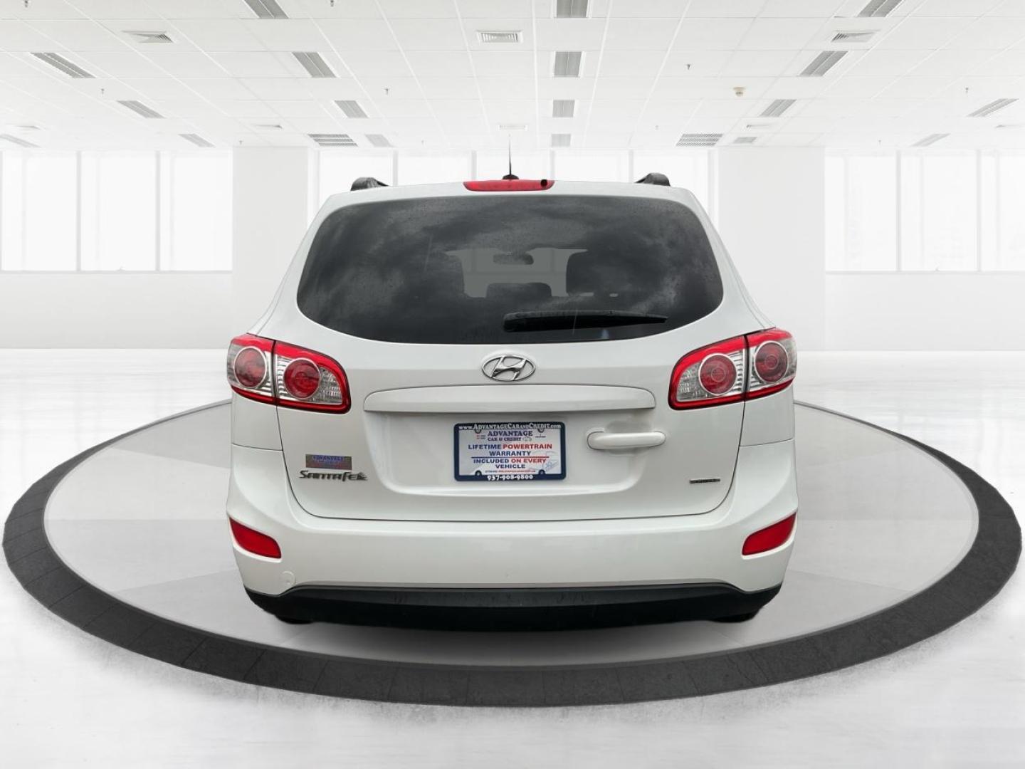 2012 Hyundai Santa Fe GLS (5XYZGDAB5CG) with an 2.4L I-4 DOHC engine, located at 1099 N County Rd 25A, Troy, OH, 45373, (937) 908-9800, 40.057079, -84.212883 - Photo#3