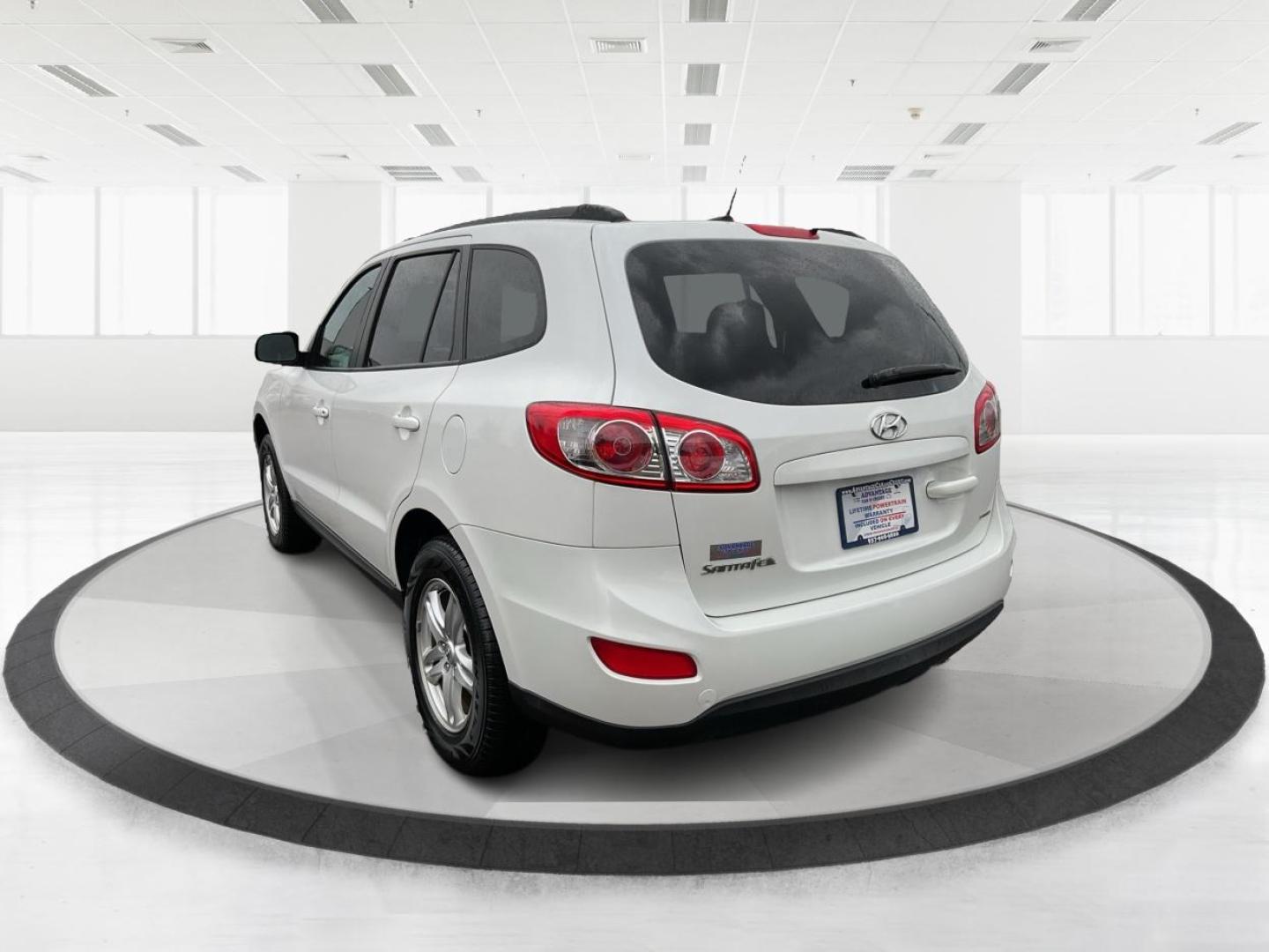 2012 Hyundai Santa Fe GLS (5XYZGDAB5CG) with an 2.4L I-4 DOHC engine, located at 1099 N County Rd 25A, Troy, OH, 45373, (937) 908-9800, 40.057079, -84.212883 - Photo#4