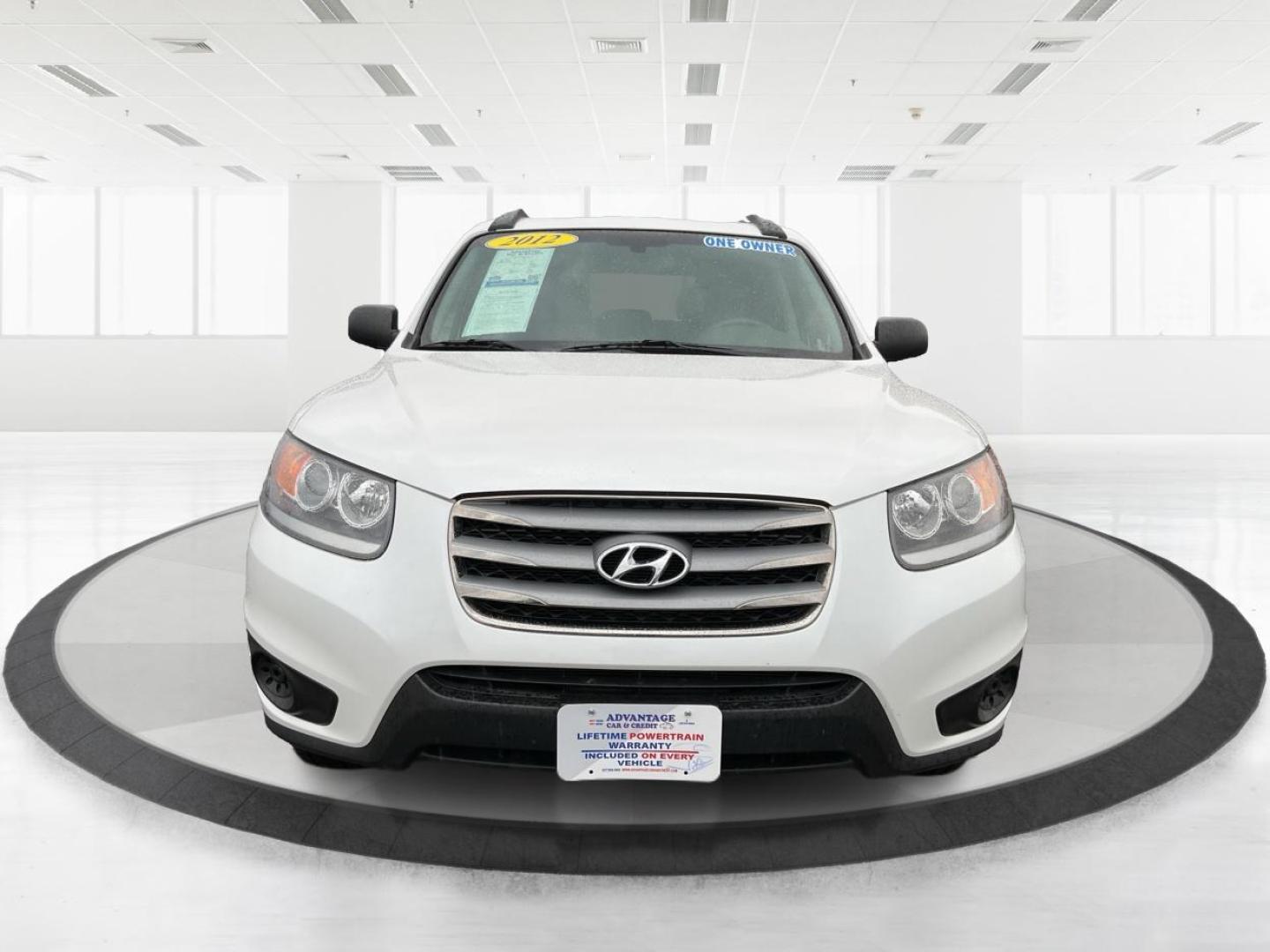 2012 Hyundai Santa Fe GLS (5XYZGDAB5CG) with an 2.4L I-4 DOHC engine, located at 1099 N County Rd 25A, Troy, OH, 45373, (937) 908-9800, 40.057079, -84.212883 - Photo#6