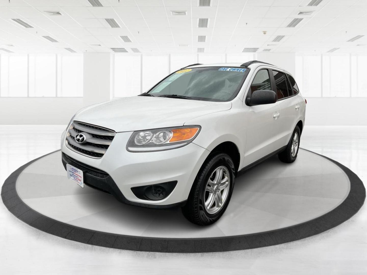 2012 Hyundai Santa Fe GLS (5XYZGDAB5CG) with an 2.4L I-4 DOHC engine, located at 1099 N County Rd 25A, Troy, OH, 45373, (937) 908-9800, 40.057079, -84.212883 - Photo#7