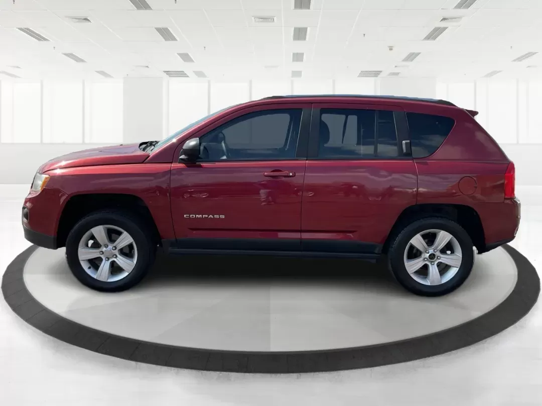 2013 Jeep Compass Latitude (1C4NJDEB6DD) with an 2.4L I-4 DOHC engine, located at 1184 Kauffman Ave, Fairborn, OH, 45324, (937) 908-9800, 39.807072, -84.030914 - Photo#5