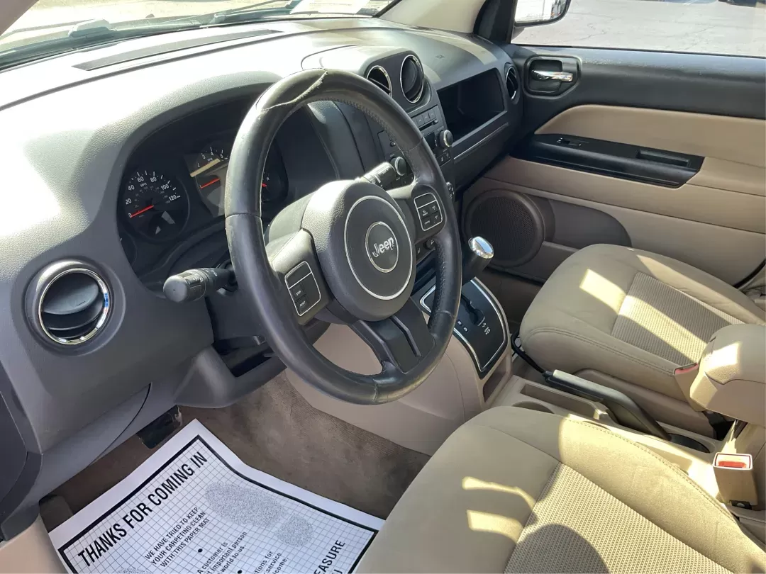 2013 Jeep Compass Latitude (1C4NJDEB6DD) with an 2.4L I-4 DOHC engine, located at 1184 Kauffman Ave, Fairborn, OH, 45324, (937) 908-9800, 39.807072, -84.030914 - Photo#8