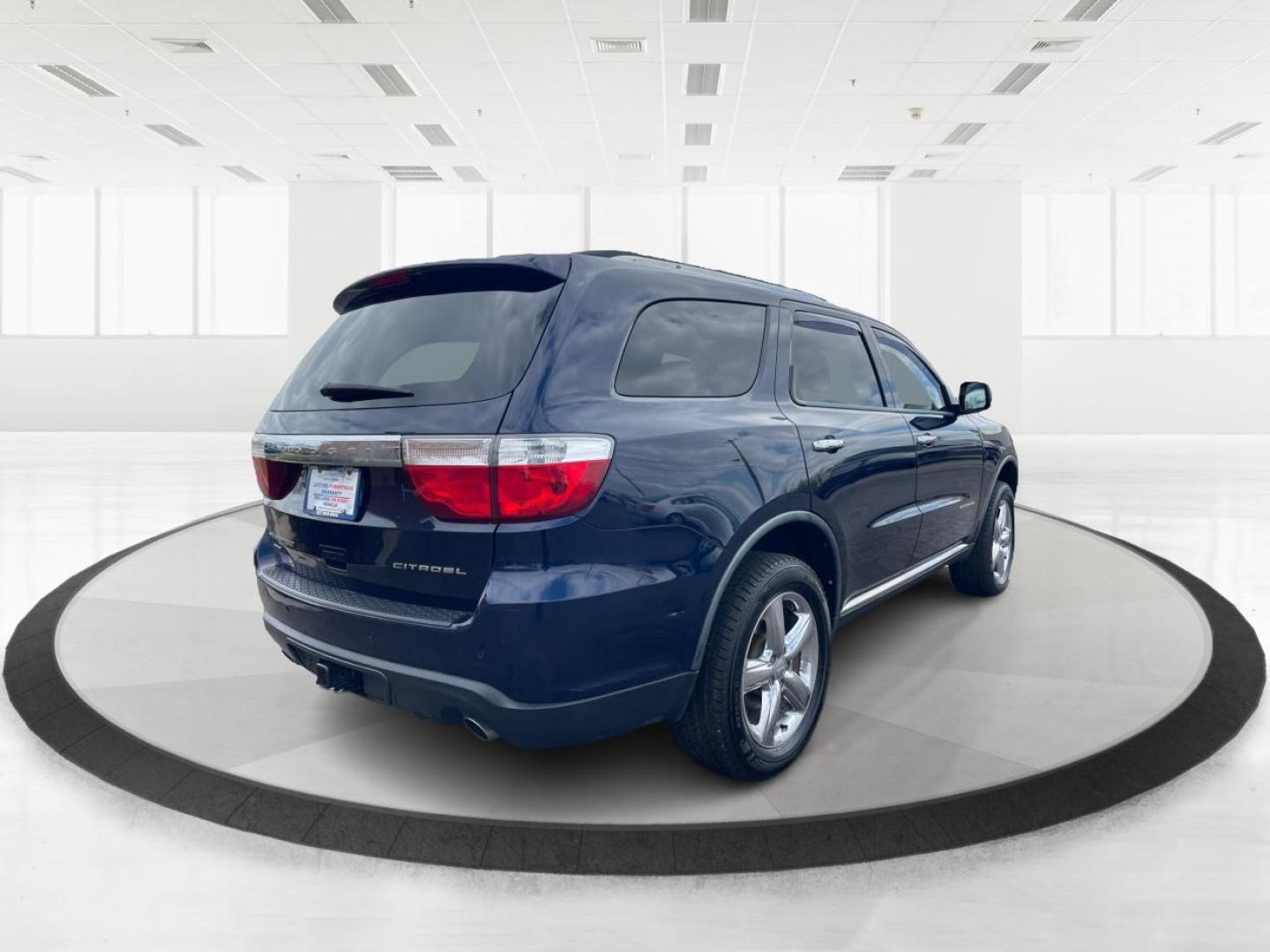 2012 Dodge Durango Citadel (1C4SDJET9CC) with an 3.6L V-6 DOHC engine, located at 8750 N County Rd 25A, Piqua, OH, 45356, (937) 908-9800, 40.164391, -84.232513 - Photo#2