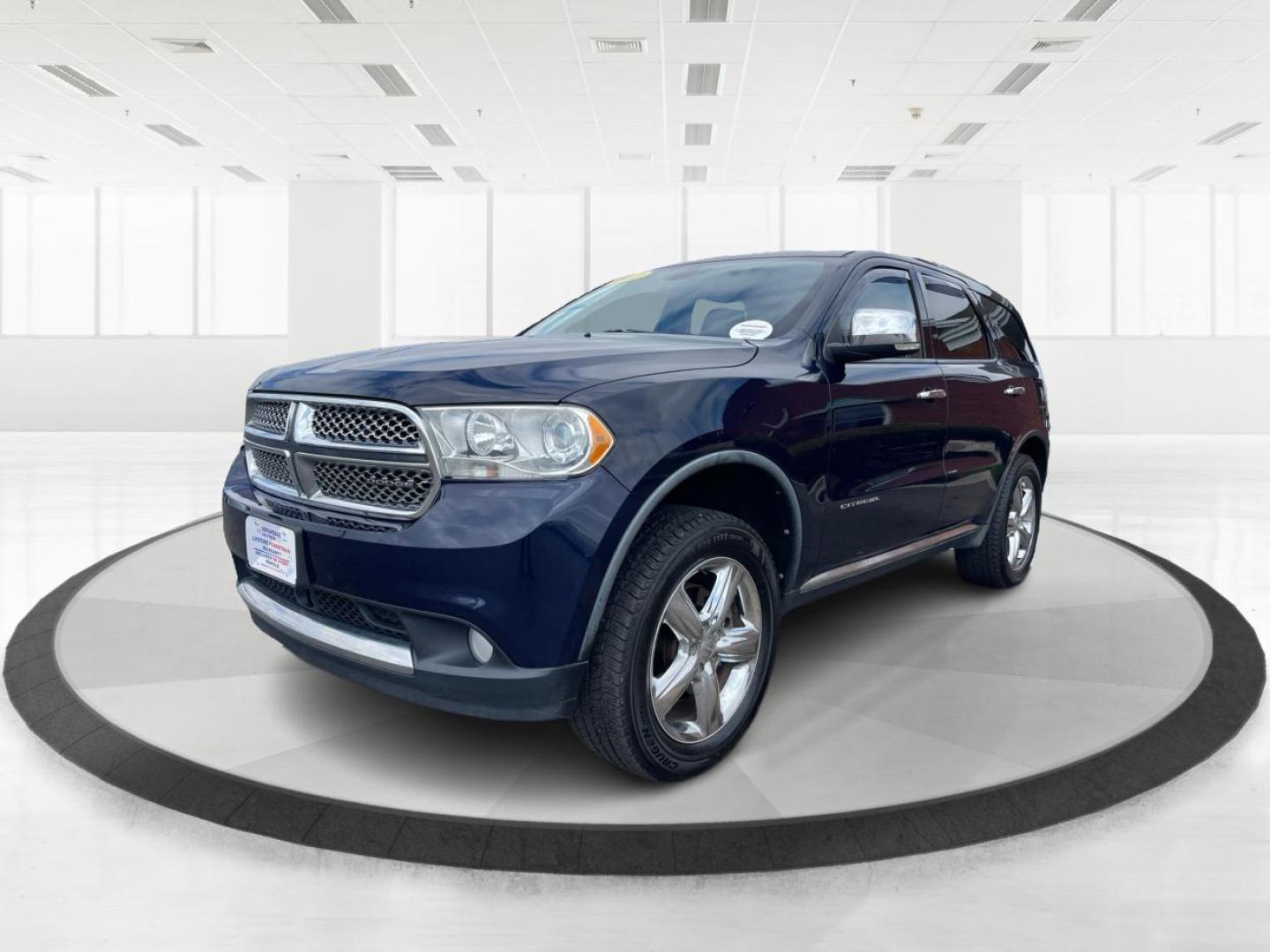2012 Dodge Durango Citadel (1C4SDJET9CC) with an 3.6L V-6 DOHC engine, located at 8750 N County Rd 25A, Piqua, OH, 45356, (937) 908-9800, 40.164391, -84.232513 - Photo#7
