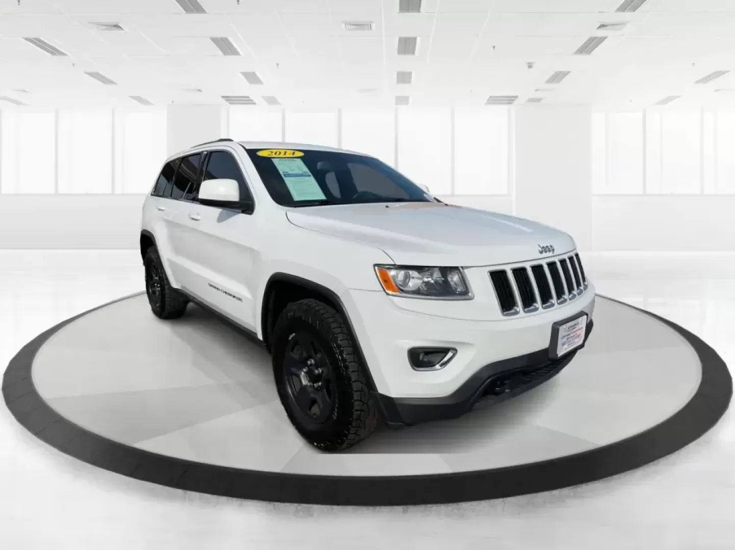 2014 Jeep Grand Cherokee Laredo (1C4RJFAGXEC) with an 3.6L V-6 DOHC engine, located at 1951 S Dayton Lakeview Rd., New Carlisle, OH, 45344, (937) 908-9800, 39.890999, -84.050255 - Photo#0