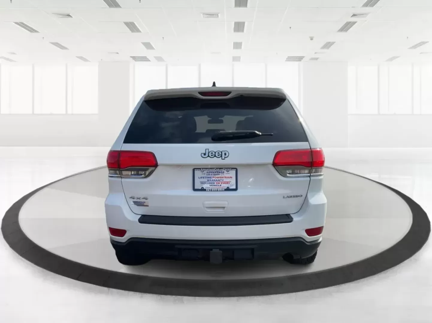 2014 Jeep Grand Cherokee Laredo (1C4RJFAGXEC) with an 3.6L V-6 DOHC engine, located at 1951 S Dayton Lakeview Rd., New Carlisle, OH, 45344, (937) 908-9800, 39.890999, -84.050255 - Photo#3