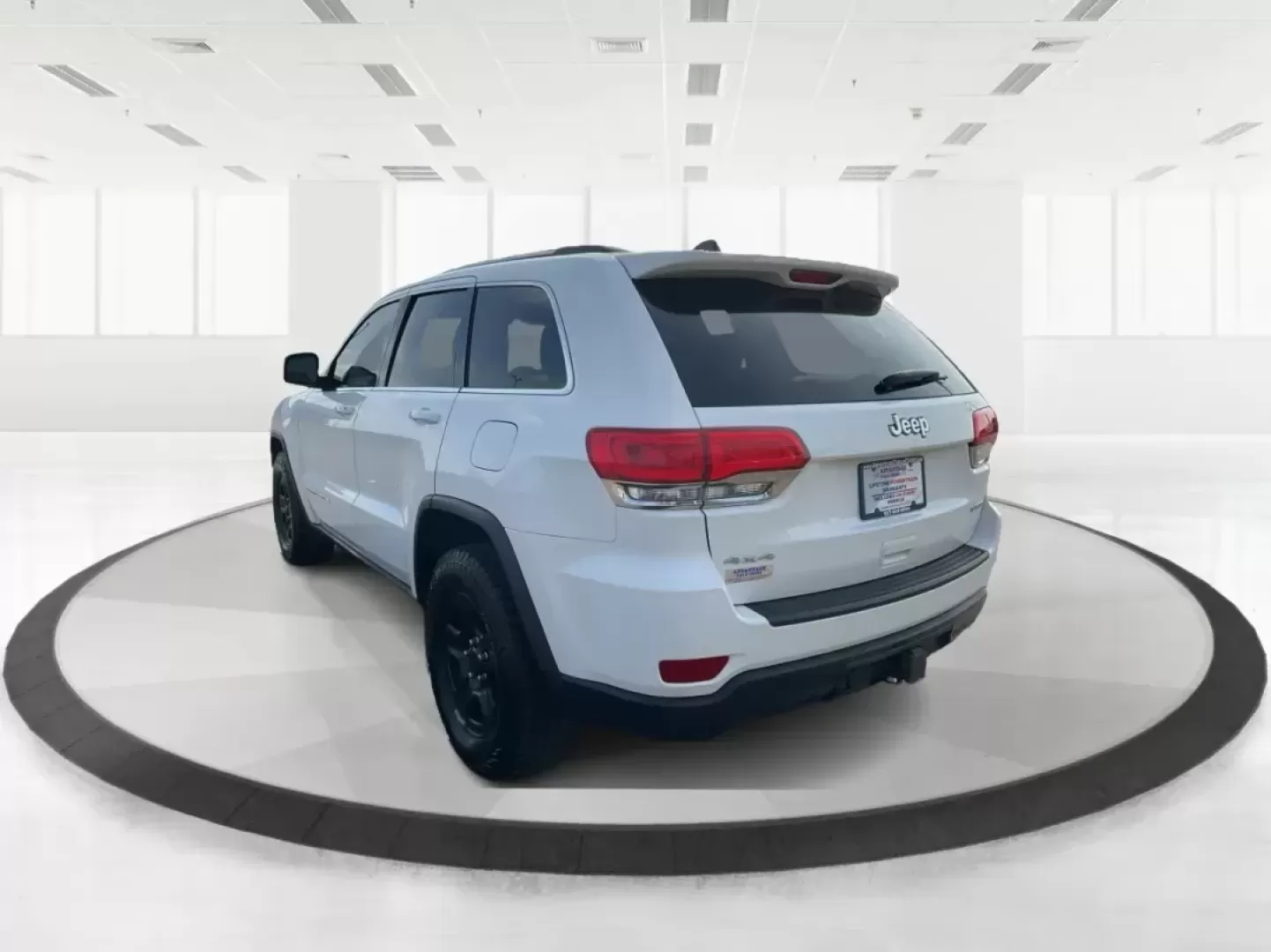 2014 Jeep Grand Cherokee Laredo (1C4RJFAGXEC) with an 3.6L V-6 DOHC engine, located at 1951 S Dayton Lakeview Rd., New Carlisle, OH, 45344, (937) 908-9800, 39.890999, -84.050255 - Photo#4
